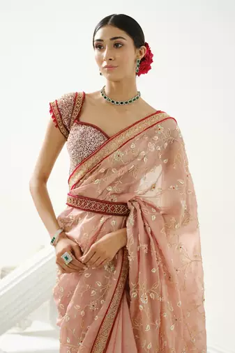 Coffee floral handcrafted saree in organza paired with maroon sequin blouse and belt