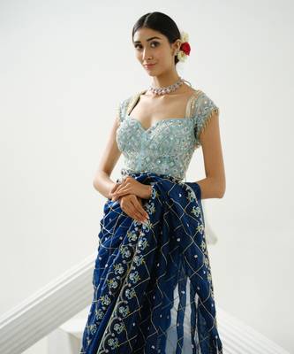 Blue organza floral handcrafted saree paired with sea blue geometric sequin blouse 5
