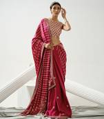 Cherry pink linear handcrafted saree paired with satin incut handcrafted blouse