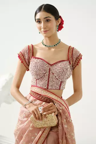 Coffee floral handcrafted saree in organza paired with maroon sequin blouse and belt