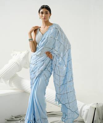 Powder blue sequin scallop saree paired with steel grey sequin strap blouse 2