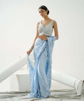 Powder blue sequin scallop saree paired with steel grey sequin strap blouse 3