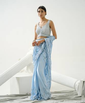 Powder blue sequin scallop saree paired with steel grey sequin strap blouse 4