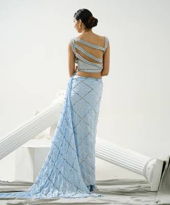 Powder blue sequin scallop saree paired with steel grey sequin strap blouse 5