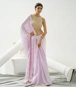 Lilac sequin scallop saree paired with lilac incut crystal blouse