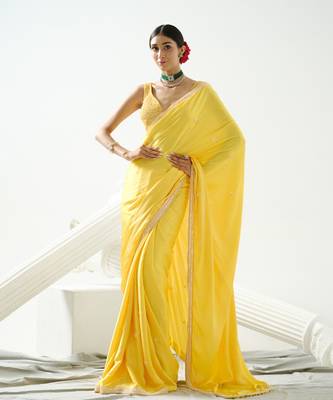 Yellow crystal and sequin handcrafted saree paired with sequin strap blouse 1