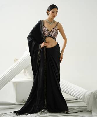 Black geometric satin silk saree paired with a sequin embellished  cross back strap blouse 1