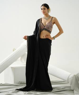 Black geometric satin silk saree paired with a sequin embellished  cross back strap blouse 5
