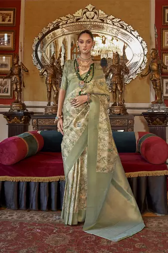 Cream and light green tussar silk digital print zari border contemporary saree