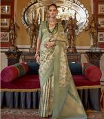 Cream and light green tussar silk digital print zari border contemporary saree