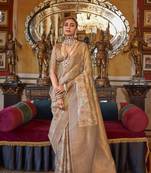 Cream and light brown tussar silk digital print zari border contemporary saree