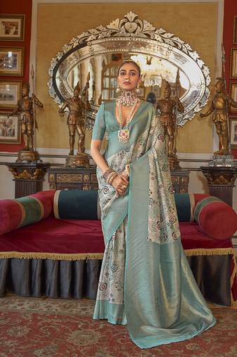 Turquoise tussar silk digital print zari border contemporary saree