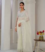 Designer cream sequence embroidery zarkan border organza saree