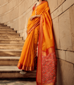 Orange patola style silk bland contrust border saree with Blouse