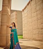 Teal patola style silk bland contrust border saree with Blouse