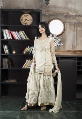 Beige embroidered chanderi silk stitched asymmetrical sharara kurta & dupatta  3