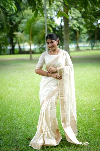 White Raw Silk Saree With All Over Zari Weaving Pattern With Running Blouse Piece