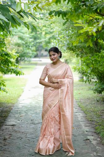 Peach Raw Silk Saree With All Over Zari Weaving Pattern With Running Blouse Piece