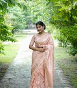 Peach Raw Silk Saree With All Over Zari Weaving Pattern With Running Blouse Piece