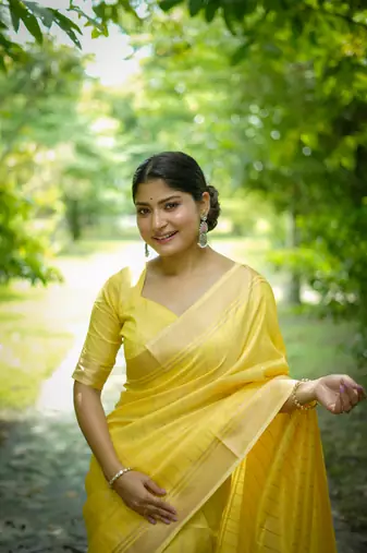 Yellow Raw Silk Saree With All Over Zari Weaving Pattern With Running Blouse Piece
