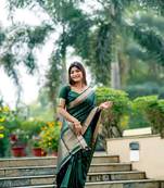 Green Raw Silk Saree With All Over Zari Weaving Pattern With Running Blouse Piece