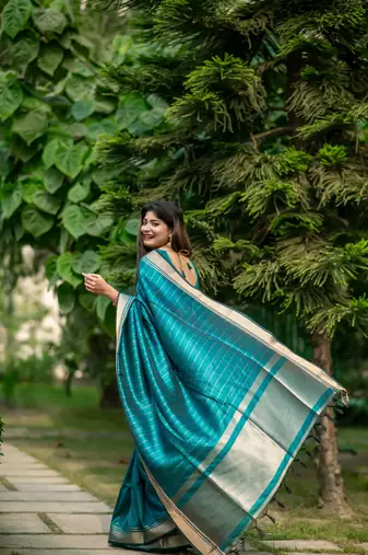 Teal Raw Silk Saree With All Over Zari Weaving Pattern With Running Blouse Piece