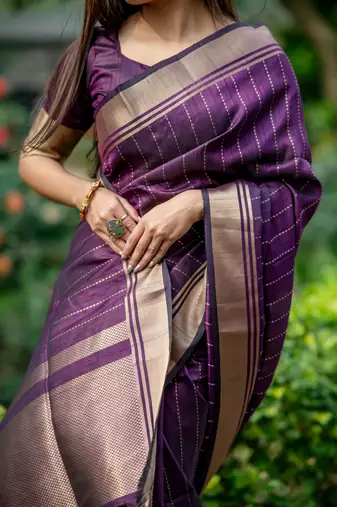 Purple Raw Silk Saree With All Over Zari Weaving Pattern With Running Blouse Piece