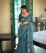 Teal Tussar Silk Saree With Printed Pallu And Floral Embroidery Work Border With Blouse