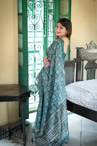 Teal Tussar Silk Saree With Printed Pallu And Floral Embroidery Work Border With Blouse