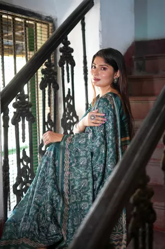 Teal Tussar Silk Saree With Printed Pallu And Floral Embroidery Work Border With Blouse