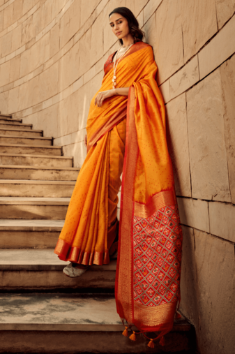 Orange Soft Khadi Raw Silk With Patola Weaving Pallu And Zari Weaving Border With Blouse