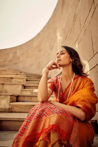 Orange Soft Khadi Raw Silk With Patola Weaving Pallu And Zari Weaving Border With Blouse