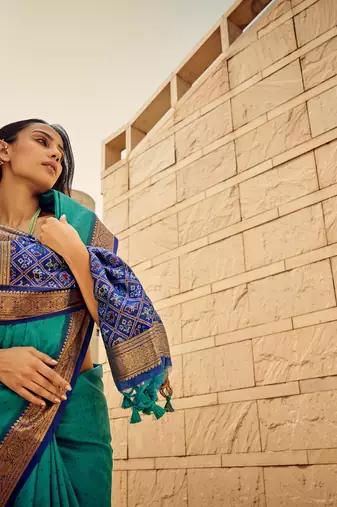 Teal Soft Khadi Raw Silk With Patola Weaving Pallu And Zari Weaving Border With Blouse