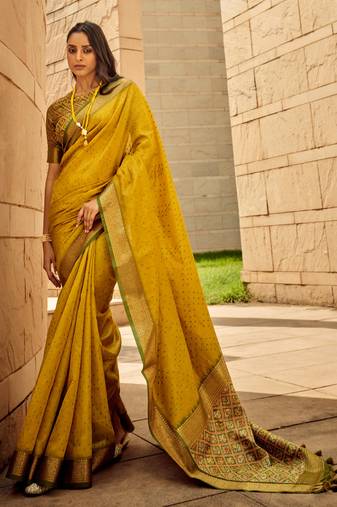 Yellow Soft Khadi Raw Silk With Patola Weaving Pallu And Zari Weaving Border With Blouse