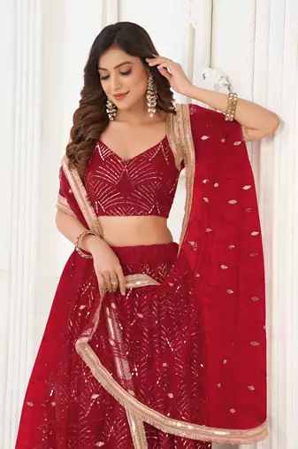 RED NET FABRIC LAHENGA WITH SEQUINS AND THREAD EMBROIDERY WORK