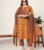  piping on yoke floral print mustard cotton kurta set with dupatta set