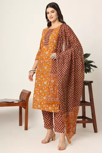 piping on yoke floral print mustard cotton kurta set with dupatta set