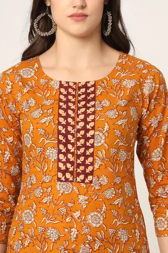  piping on yoke floral print mustard cotton kurta set with dupatta set