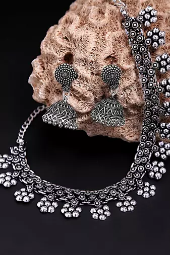 Oxidised silver-plated kolhapuri floral jewelry set with jhumkis