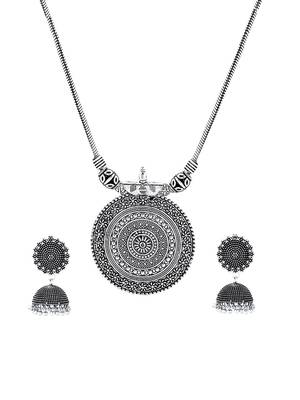 Oxidised silver-plated jewelry set with circular textured centerpiece and jhumkas 3