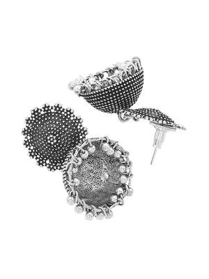 Oxidised silver-plated jewelry set with circular textured centerpiece and jhumkas 4