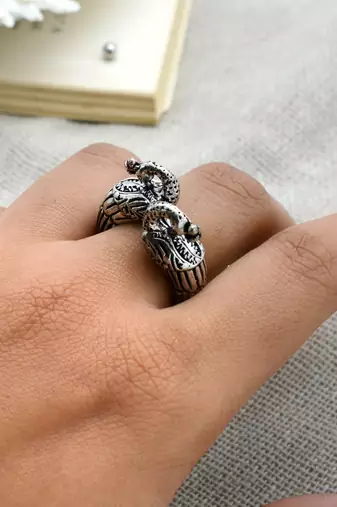 Peacock silver oxidized open ring with intricate motifs