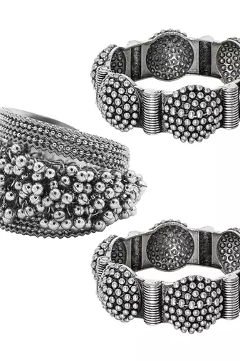 Stacked bracelet set with traditional motifs and contemporary design