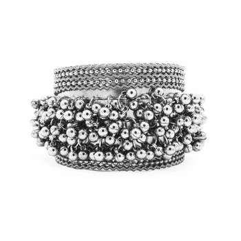 Stacked bracelet set with traditional motifs and contemporary design 3