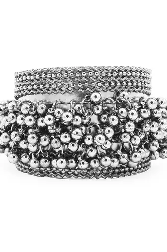 Stacked bracelet set with traditional motifs and contemporary design