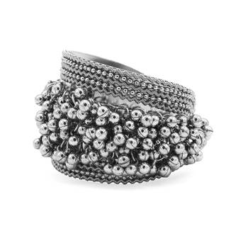 Stacked bracelet set with traditional motifs and contemporary design 5