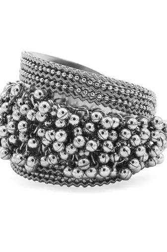 Stacked bracelet set with traditional motifs and contemporary design