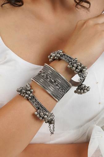 Stacked bracelet set with oxidised bracelet and embossed cuff