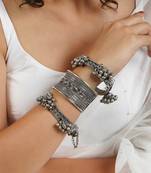 Stacked bracelet set with oxidised bracelet and embossed cuff