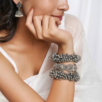 Silver-plated stacked bracelet set with delicate details 1